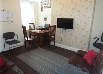 A Cozy Living Room Featuring A Comfortable Seating...