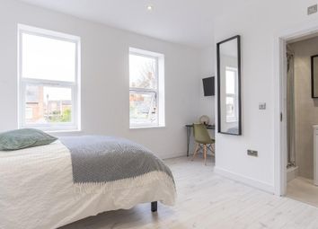 A Bright And Spacious Master Bedroom Featuring Lar...