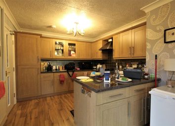 A Spacious And Inviting Kitchen With Ample Storage...