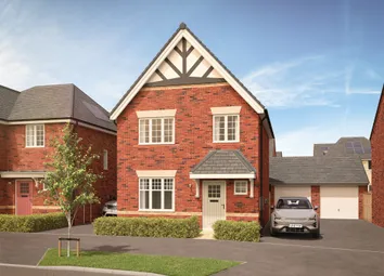 A Modern Red Brick House With A Pitched Roof And White-Trimmed Windows Stands In The Foreground