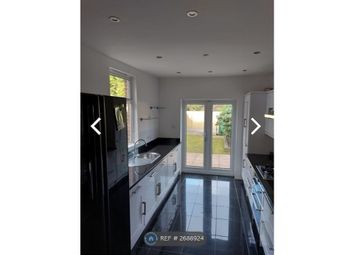 Kitchen With French Doors Onto Garden.