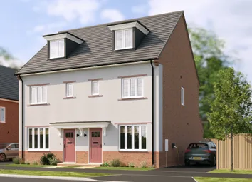 A Modern Semi-Detached House With Pink Doors And Dormer Windows Stands In The Foreground