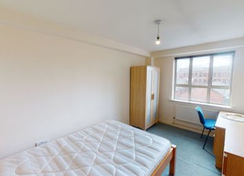 A Bright Double Bedroom Featuring A Large Window T...