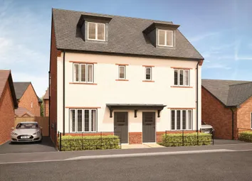 A Modern Semi-Detached House With A Manicured Lawn In The Foreground Is Surrounded By Other Brick Ho