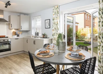 Kitchen And Dining Room With Dark Chairs