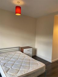 A Clean And Inviting Master Bedroom Featuring A Sp...