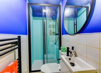 Modern Bathroom Featuring A Sleek Shower Enclosure...