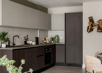 Living Space In Foreground, Kitchen With Dining Table In Background, Decorated In Neutral Tones.