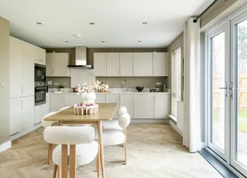 A Modern Kitchen And Dining Area With Ample Storage Space