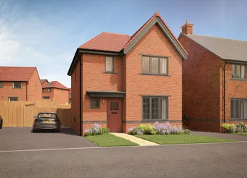 A Modern Brick House With A Red Door And Manicured Lawn Sits In The Foreground