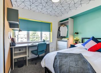 Bright And Stylish Bedroom Featuring A Large Windo...