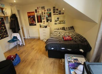 A Well-Lit Spacious Bedroom With A Double Bed, Fea...