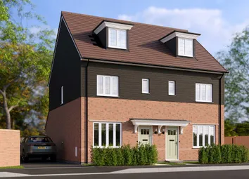A Two-Story Brick And Wood-Paneled House With A Slanted Roof And Dormers