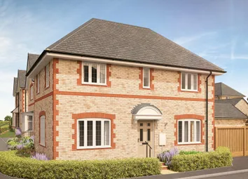 A Modern Brick House With Bay Windows And A Gray Roof Stands In The Foreground
