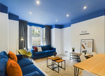 A Spacious And Stylish Modern Living Room, Perfect...