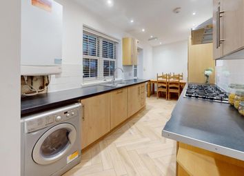 A Spacious And Modern Kitchen Equipped With A Wash...