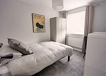 A Bright And Inviting Double Bedroom Featuring A c...