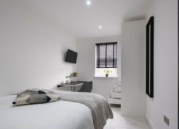 Bright And Modern Master Bedroom Featuring A Comfo...