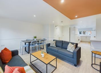 A Spacious And Modern Living Room, Perfect For Soc...