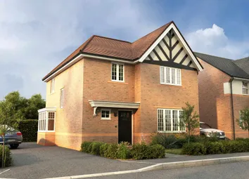 A Two-Story Brick House With A Distinctive Tudor-Style Facade