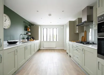 The Kitchen Is Spacious With Plenty Of Storage