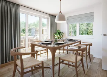 Double Doors Lead Out The The Garden From The Dining Area