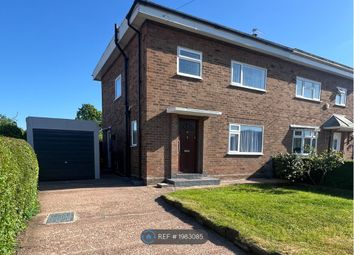 Front Of House And 2 Car Drive