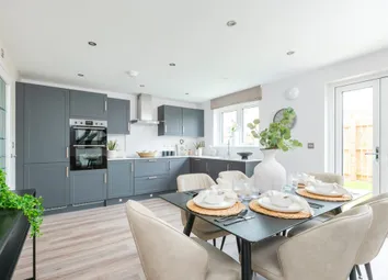 A Spacious Kitchen And Dining Area With French Doors To The Rear Garden