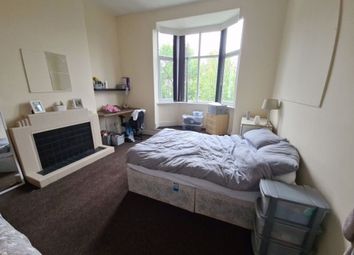 A Spacious Master Bedroom Featuring A Large Bay Wi...