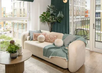 Decorated Living-Dining Area With Ample Natural Lighting From Windows And Balcony Doors