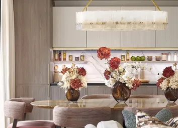 Living Space In Foreground, Kitchen And Dining Table In Background.