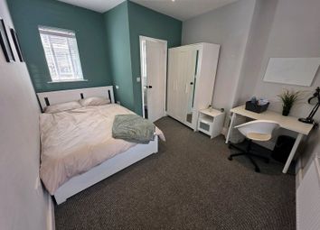 Well-Maintained Double Bedroom Featuring A Comfort...