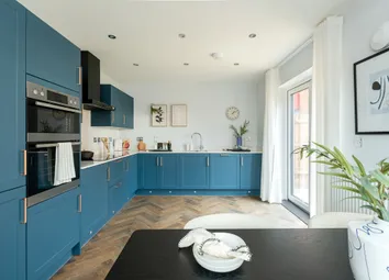 A Stylish Kitchen Diner With Double Doors To The Garden