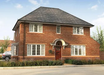A Two-Story House With A Gabled Roof And A Prominent Entryway