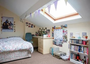 A Bright And Inviting Master Bedroom With Ample Sp...