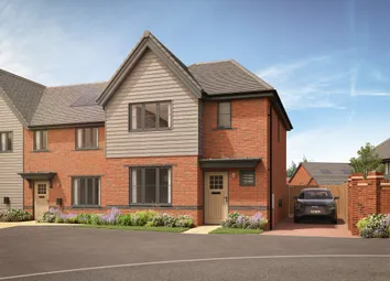A Modern Brick And Wood Townhouse With A Driveway And Car Sits In Front Of A Clear Blue Sky With Wis