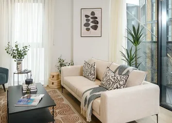 Contemporary Designed Living Space With Glass Balcony Doors Adjacent