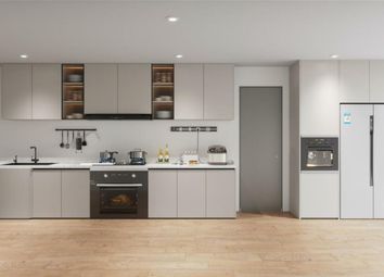 A Modern And Spacious Kitchen Equipped With Stylis...