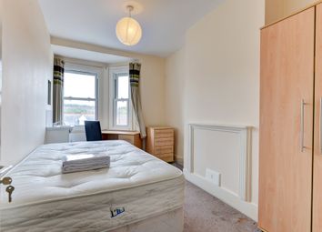 A Bright And Inviting Master Bedroom With A Large ...