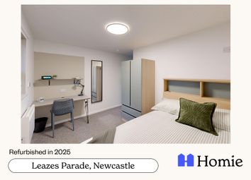 A Bright And Inviting Bedroom Featuring A Neatly m...