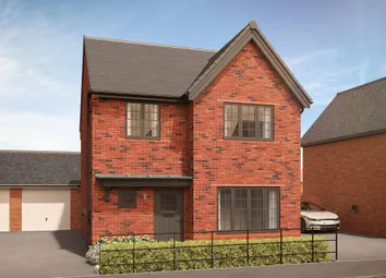 A Red Brick House With A Black Fence And Manicured Bushes In The Foreground Stands Before A Clear Bl