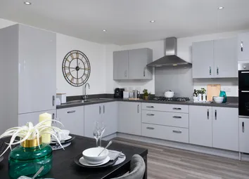 Open-Plan Kitchen/Diner With Integrated Appliances And French Doors Leading Onto Garden In Ingleby S