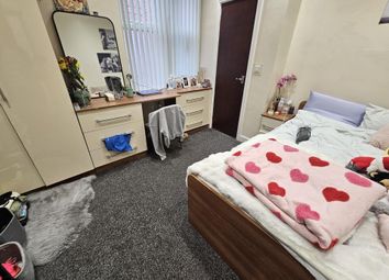 A Spacious And Inviting Master Bedroom Featuring A...