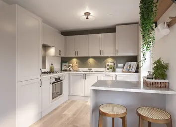 A Modern Kitchen Area With Ample Storage And Breakfast Bar