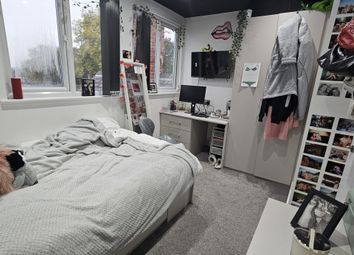 A Cozy Bedroom Featuring A Double Bed, A Large Win...