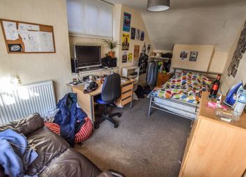 A Spacious And Cozy Bedroom Featuring A Comfortabl...