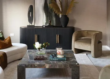Modern Decorated Living Space Or Waiting Room, With Coffee Table, Seating, Cabinets And Side Table