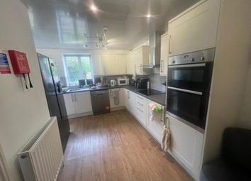 A Spacious And Modern Kitchen With Ample Natural l...