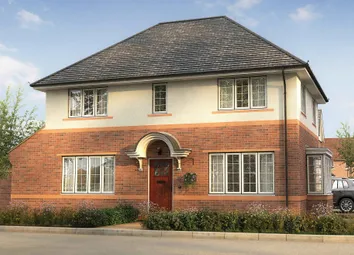 A Two-Story Brick House With A Tiled Roof