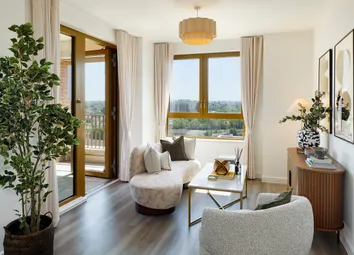 Living Area Photograph With Door Towards Balcony And Large Window With Views Towards London